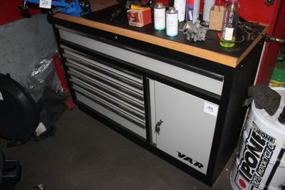 a picture of a workbench with a lot of tools on top of it