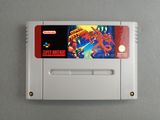 une image d'une cartouche de jeu Nintendo sur laquelle figure un dragon