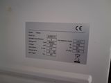 a close up of a label on a white refrigerator