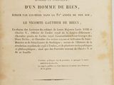 un vieux livre écrit posé sur une table