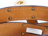 leather bracelet with a metal buckle on a white background