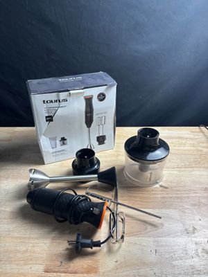 a box with a blender and a blender on a table