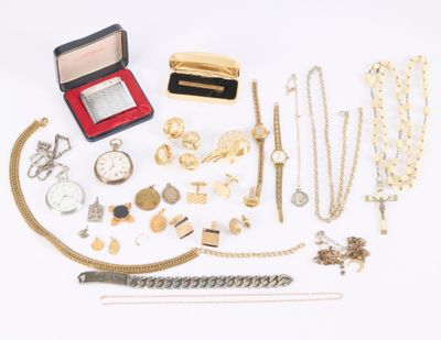 many different types of jewelry on a white surface