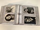 a book with pictures of people on it on a table