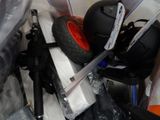 a pile of assorted items in a plastic container