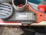 a picture of a corded sander with a small blade