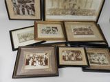 several framed photographs of people and a dog are on a table
