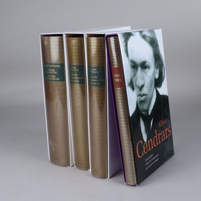 three books are stacked on top of each other on a table