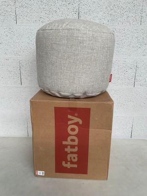 a box that has a pillow on top of it