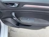 a close up of a car door handle with the door handle open