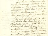 une lettre écrite à l'encre noire sur une feuille de papier
