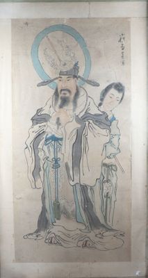 une ancienne peinture chinoise représentant un homme et une femme tenant un enfant dans leurs bras
