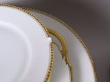 two plates that are sitting on top of each other