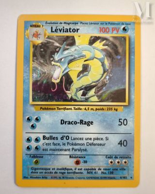 a close up of a pokemon card on a white surface