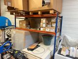 a room with a lot of boxes and boxes on the shelves