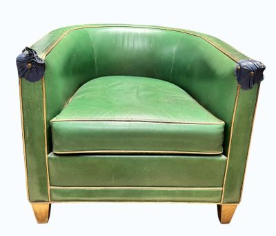 an image of a green leather chair on a white background