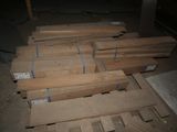 many pieces of wood stacked on top of each other