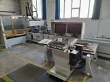 an image of a machine shop with a lot of machines in it