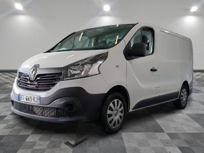a picture of a white van on a checkered floor