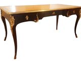 an image of a black and gold desk on a white background