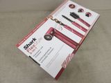 a picture of a box of hair straighteners on a couch