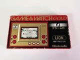 a game and watch gold game in a red case