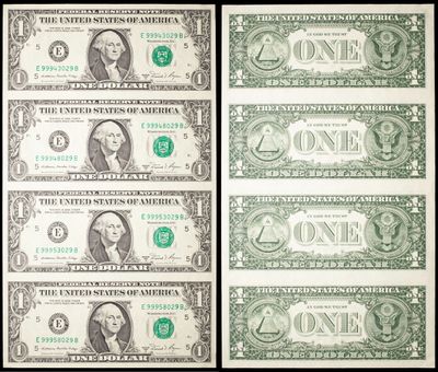 une série de billets de vingt dollars au motif vert et blanc