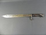 a knife that is laying on top of a table