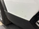 a close up of a car ' s front bumper