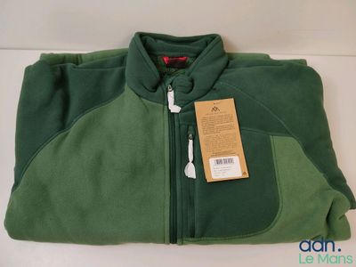 a close up of a green jacket with a tag on it