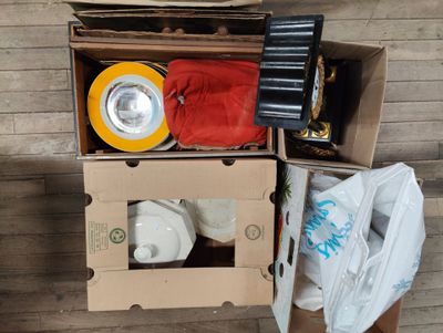 a box with a pair of shoes and a pair of sneakers