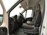 a white van with black seats in the back of it