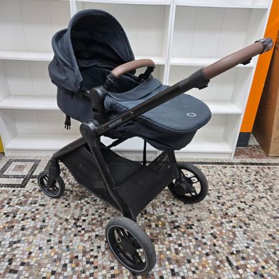 the stroller is empty and ready to be used in the room