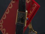 a watch that is sitting on top of a book