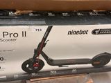 a scooter that is in the box on the floor