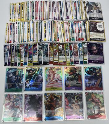 a collection of pokemon cards on display on a table
