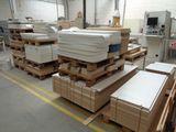 a large amount of boxes and pallets in a warehouse