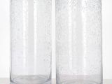 two glasses that are sitting on a table