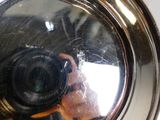 reflet d'une personne qui se prend en photo dans un miroir