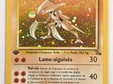 a close up of a pokemon card on a white surface