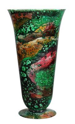 a glass vase with a green and red design on it