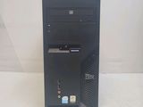a black desktop computer sitting on top of a table