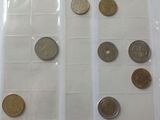 a lot of coins that are in a plastic bag
