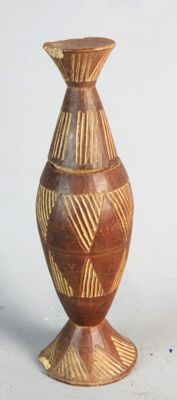 two vases that are sitting on a white surface