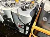 many different types of water tanks lined up on the ground