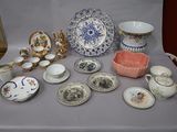 a table with a lot of china and other items on it