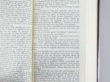 a open book with a picture of a cat on it
