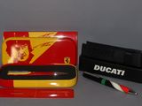 a picture of a pen and a pencil in a box