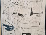 dessin représentant une ville, réalisé sur une feuille de papier