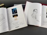 a book with a drawing of a man and a woman inside of it